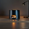 The wood-fired stove aroma diffuser features fine water mist and a seven-color ambient light. The soft and mellow fragrance accompanies the retro style details Picture